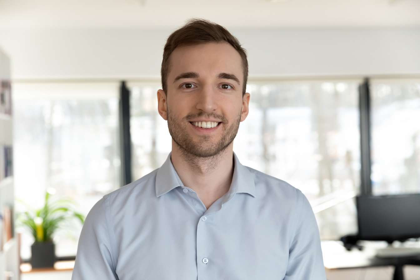 Profile picture of Caucasian male employee posing in office